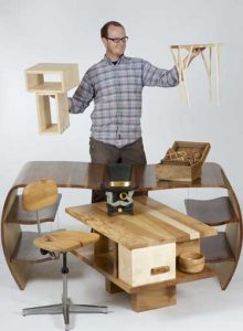 David Cheshire with the pieces of furniture he made at the Chippendale School