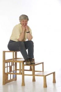 Liz Jackson on her oak library chair or steps. A piece of 'metamorphic furniture'.