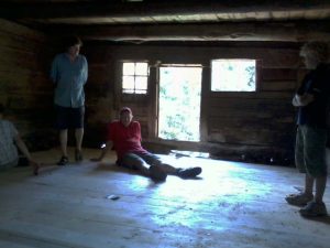 Newly laid pine floor in former cow shed. 
