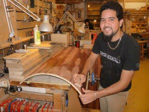Zachary Evelyn working on his curved veneered desk top.