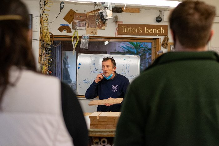 Tutor Graham Davies giving a demo at our furniture making school
