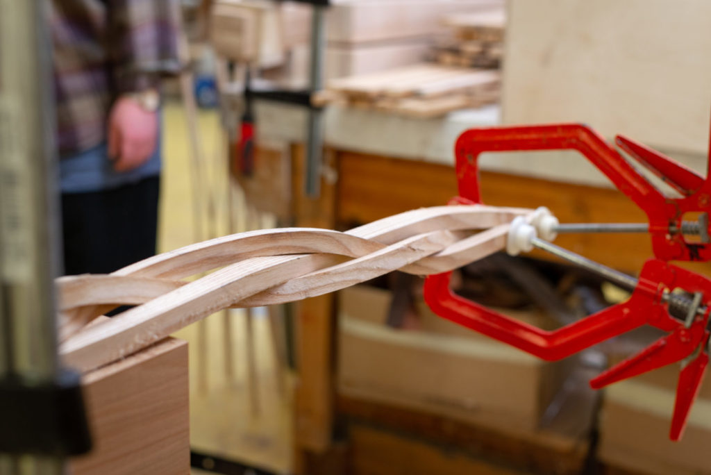 Merging machine tech with craft knowledge and skills. Intricate braided wood by a student and tutor