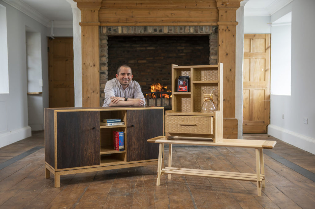 Alirio Pinilla with his furniture